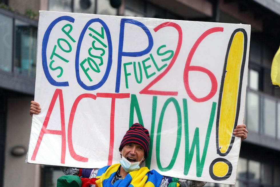 Climate activists protesting during the official final day of the Cop26 summit in Glasgow. Picture date: Friday November 12, 2021.