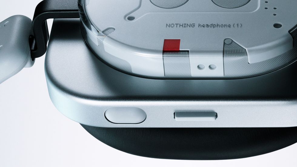 close-up shot of the controls on the side of the nothing headphone (1) showing the Roller