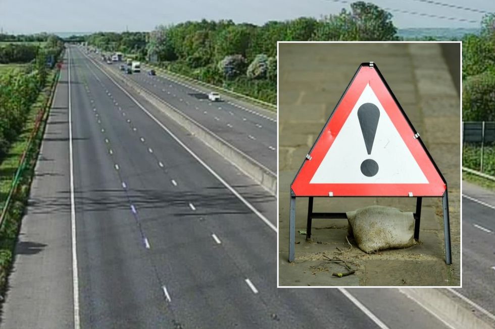 Closed M5 road and a warning sign