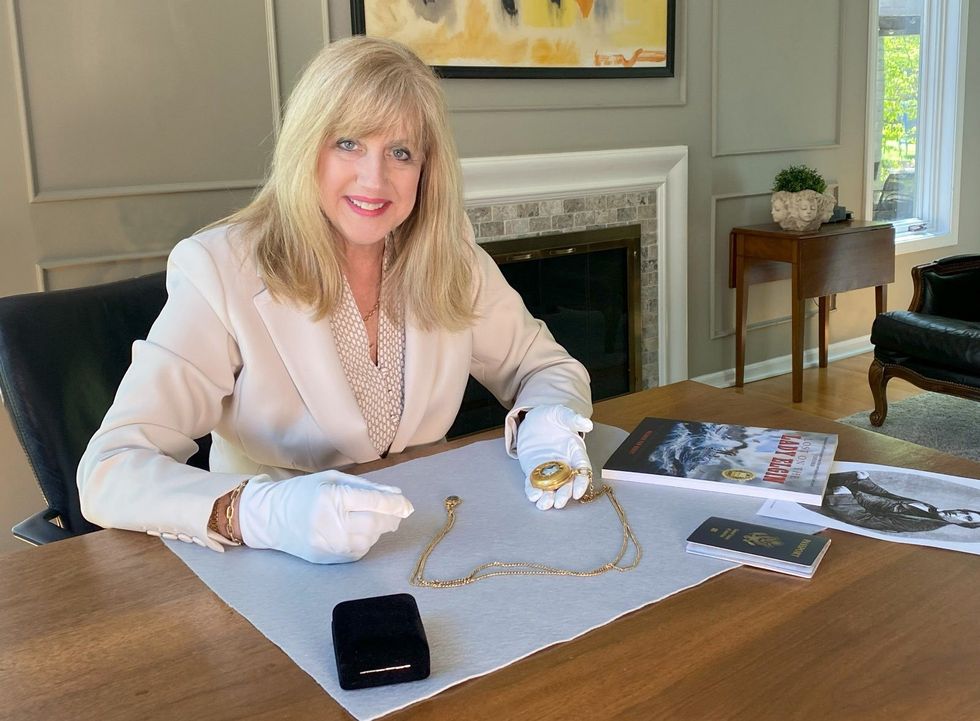 Co-founder of the Michigan Shipwreck Research Association \u200bValerie Van Heest with the pocketwatch\u200b