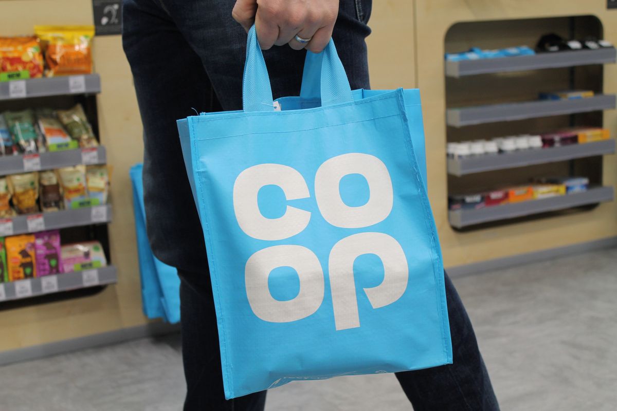 Co-op shopper with branded bags