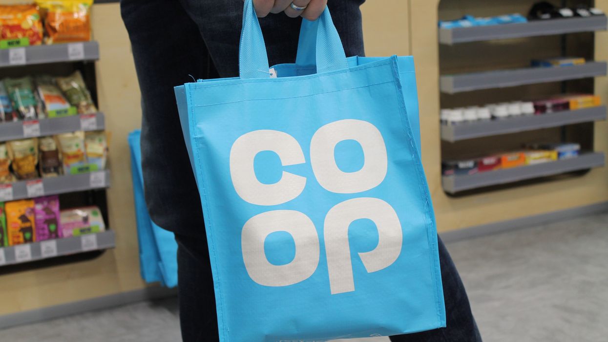 Co-op shopper with branded bags