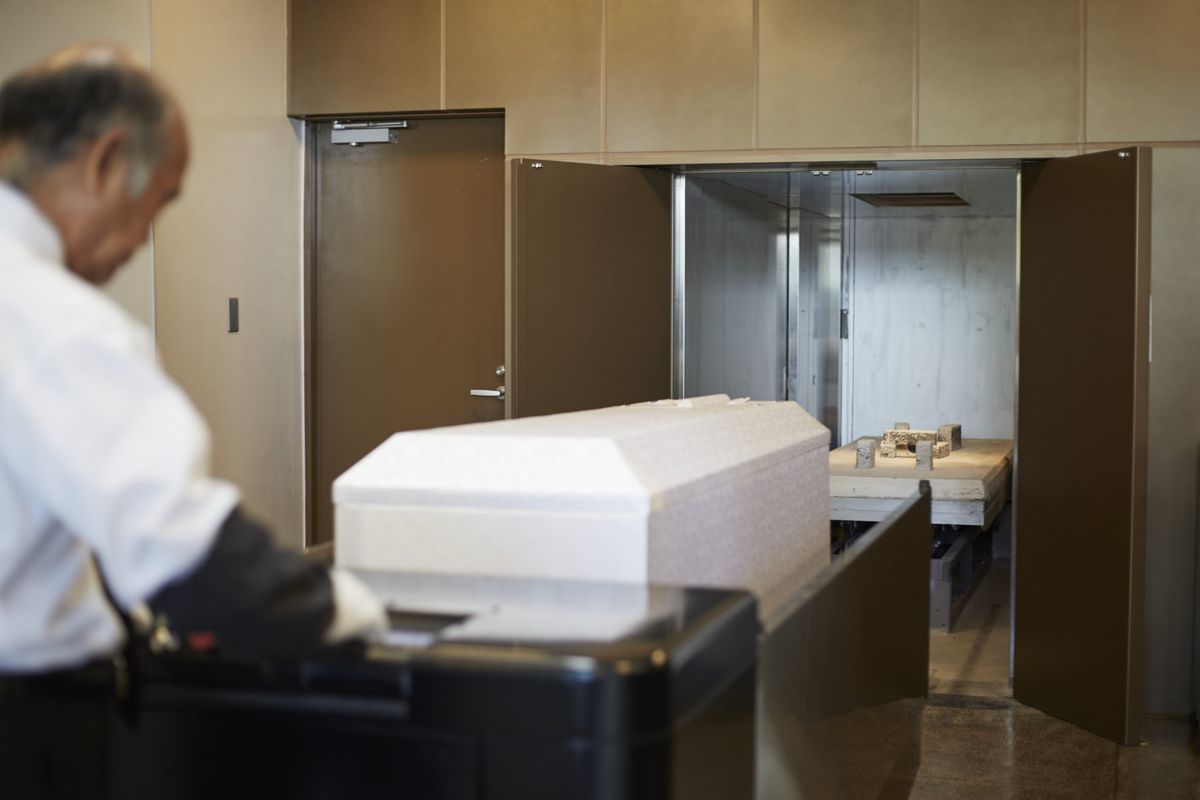 Coffin being cremated