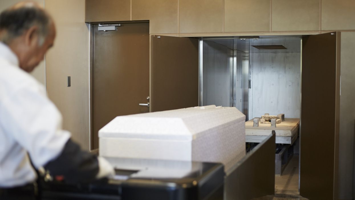 Coffin being cremated