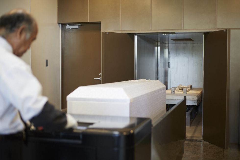 Coffin being cremated