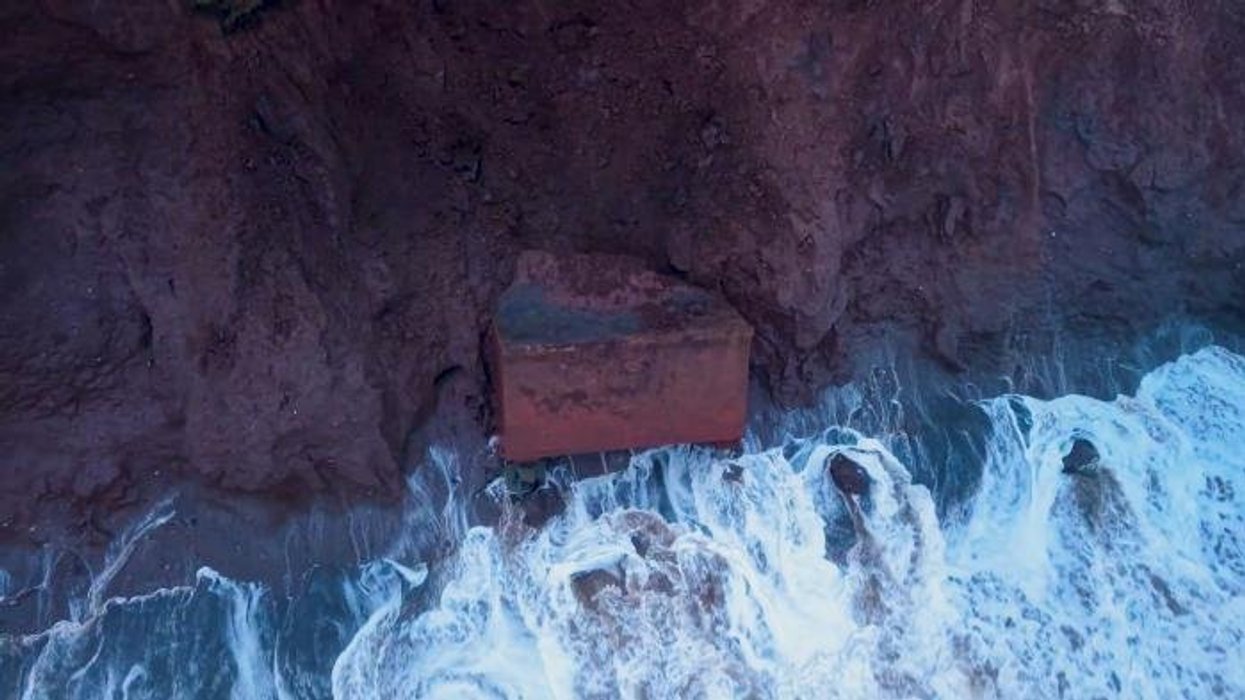 Cold War nuclear bunker collapses into sea just days after being seen teetering on cliff