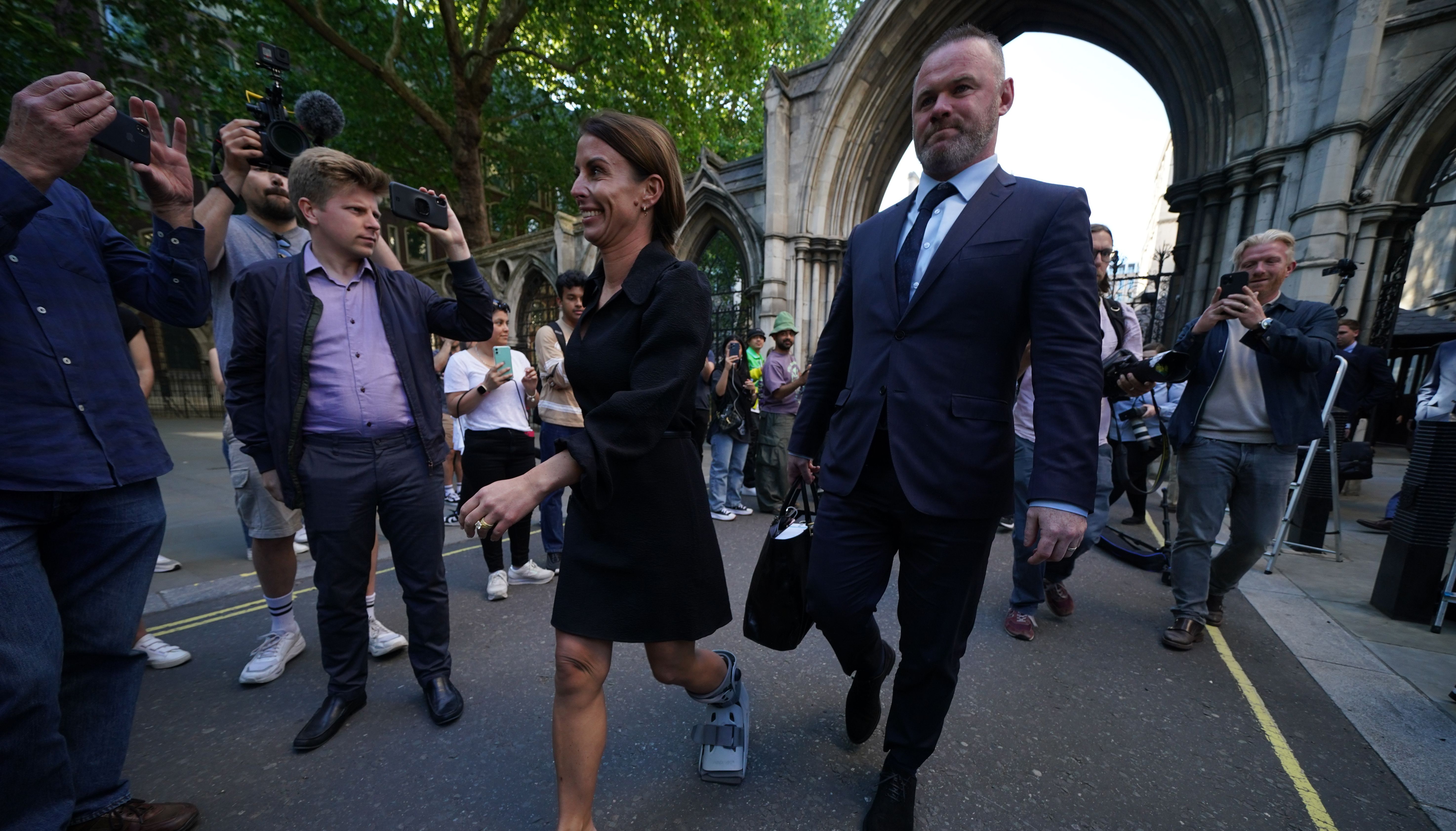 Coleen and Wayne Rooney leaves the Royal Courts Of Justice, London