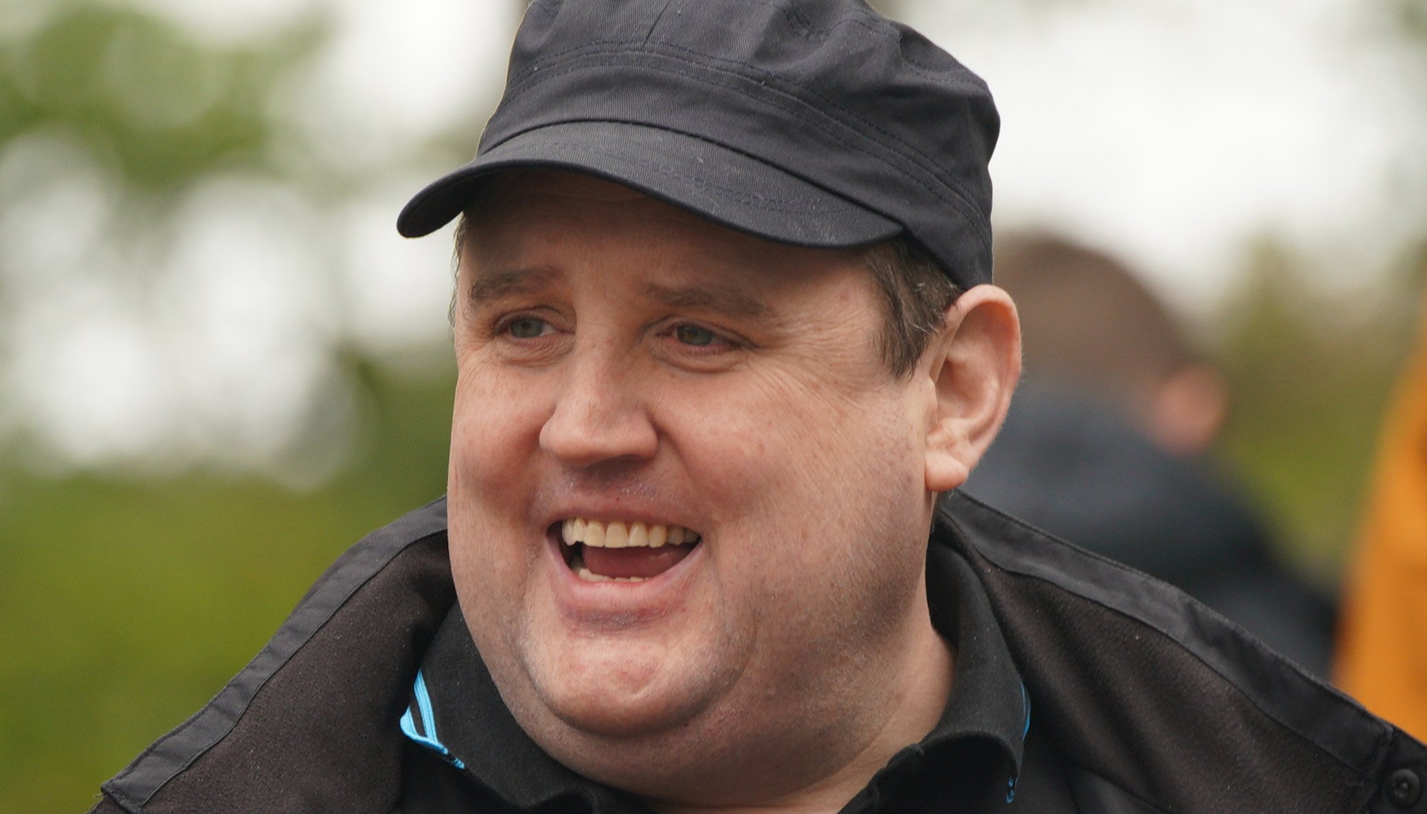 Comedian Peter Kay (centre) as he launches the Coulam Wheelyboat V17, a purpose-built fully wheelchair accessible powerboat at the Anderton Centre located on the banks of the Lower Rivington Reservoir near Bolton in Lancashire. Picture date: Saturday April 23, 2022.