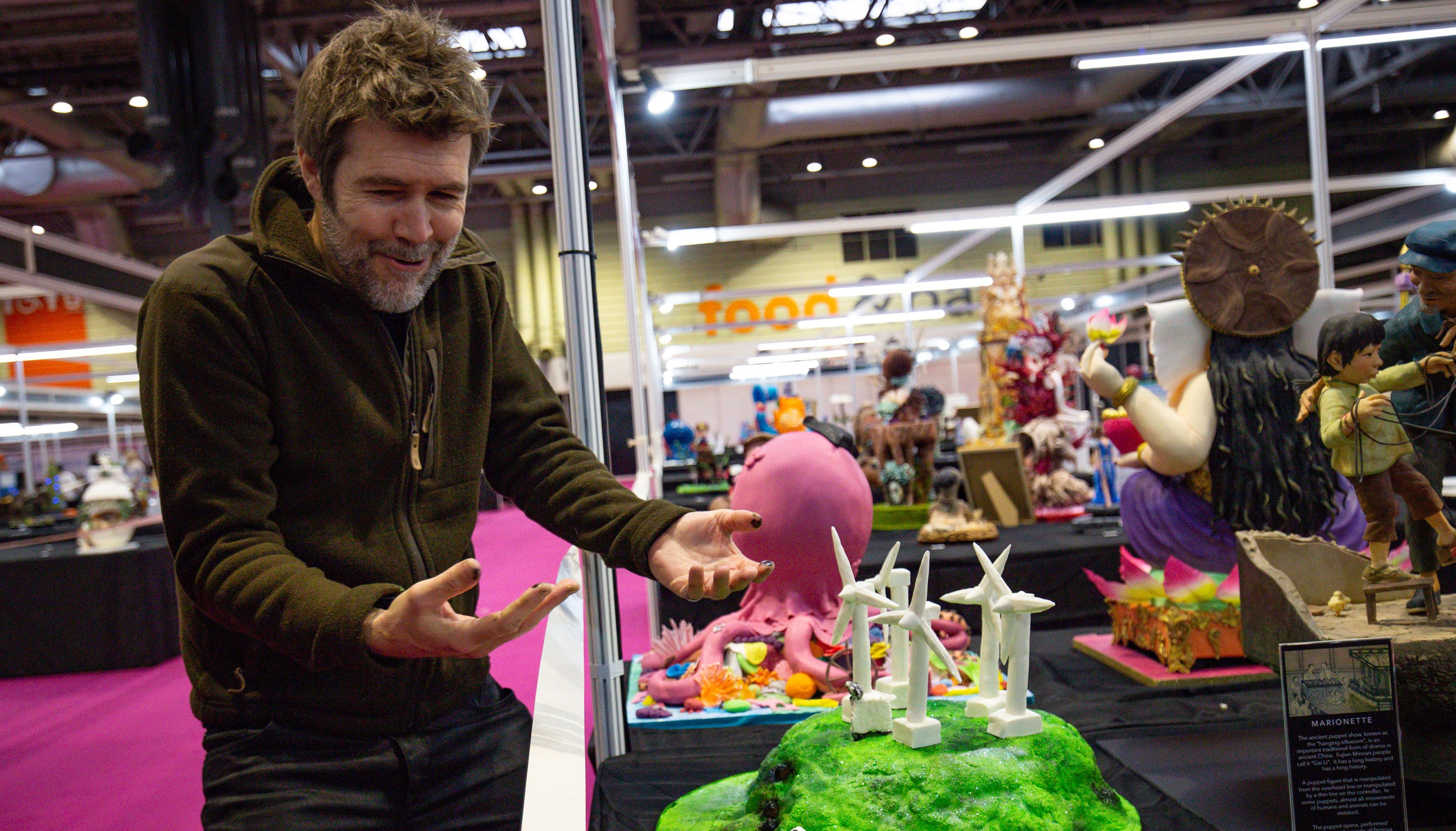 Comedian Rhod Gilbert delivering his creation during Cake International 2019 at the NEC, Birmingham.