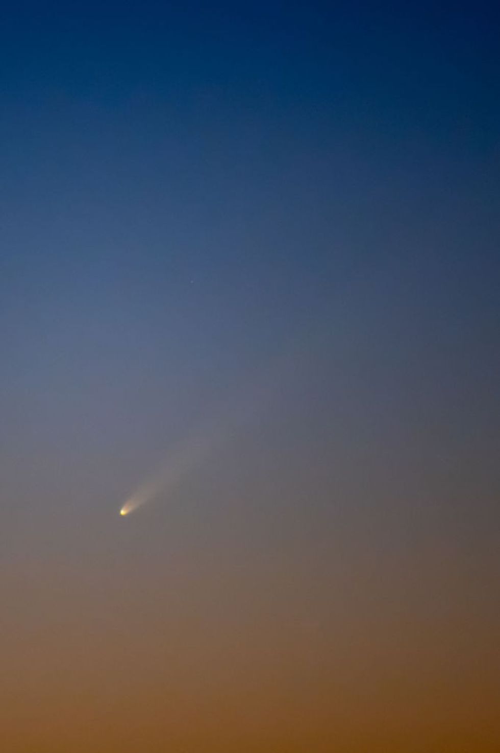Comet flying through the sky