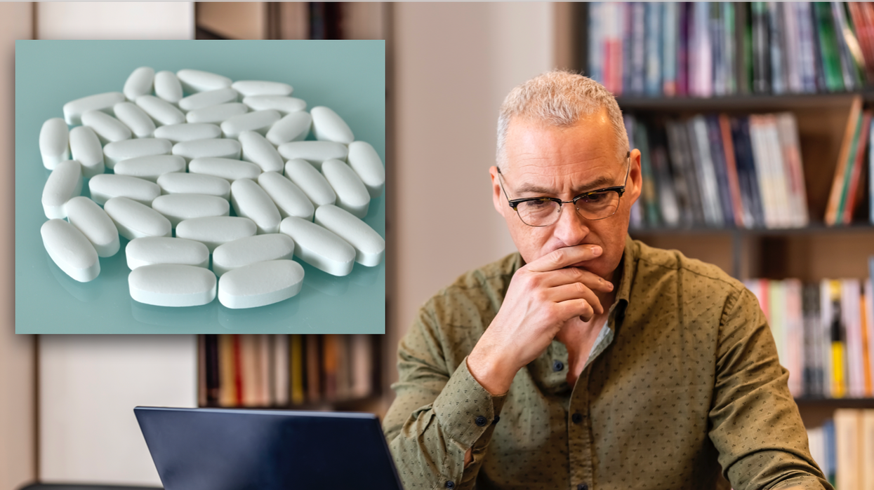 Composite image of a man studying and pills next to this face