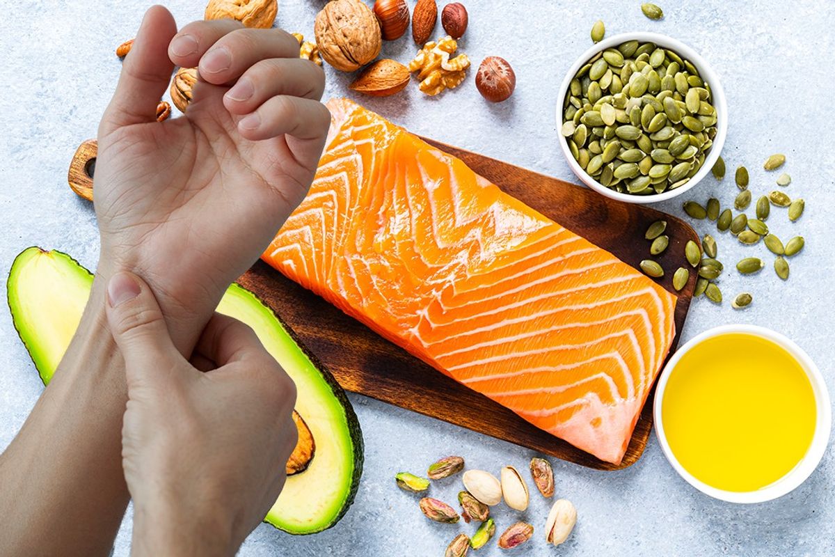 Composite image of person holding their wrist next to salmon 
