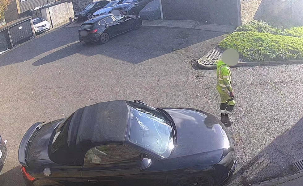 Contractor painting parking bay in Croydon