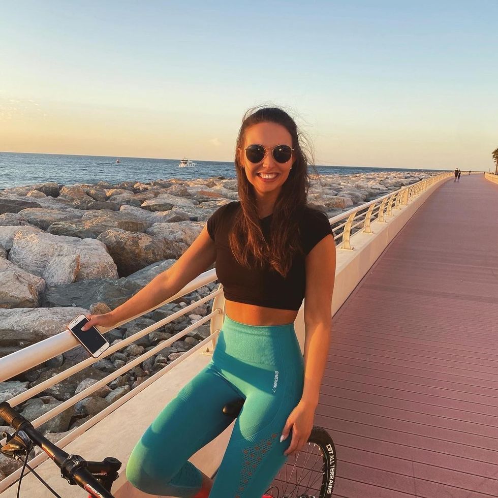 Cora Fraser cycling in Dubai