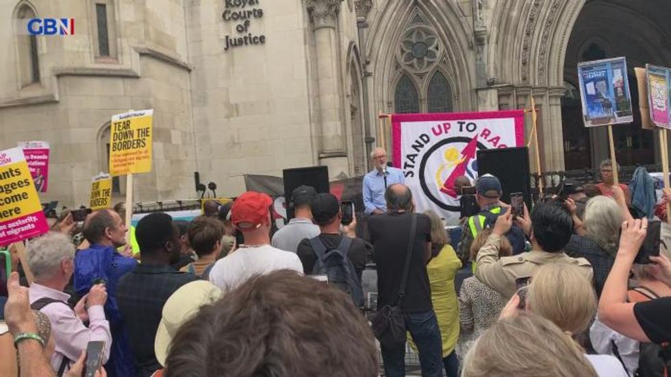 Jeremy Corbyn storms Rwanda migrant protest, saying UK can't 'outsource legal obligation' to refugees