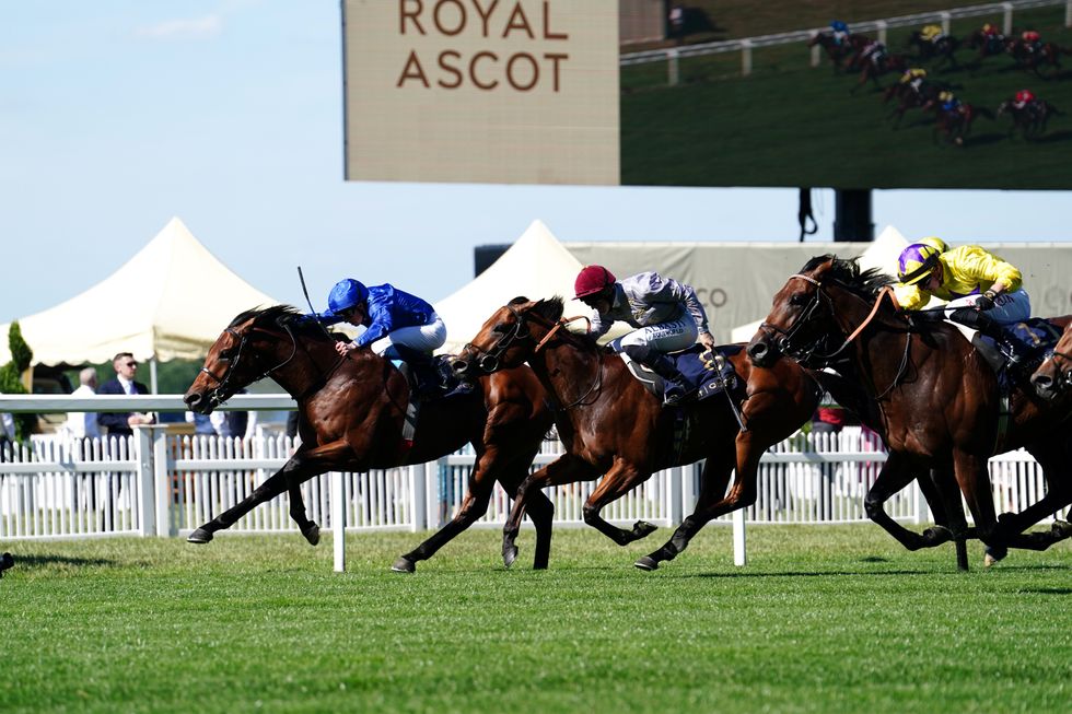 Coroebus ridden by William Buick (left) on their way to winning the St James's Palace Stakes during day one of Royal Ascot at Ascot Racecourse. Picture date: Tuesday June 14, 2022.
