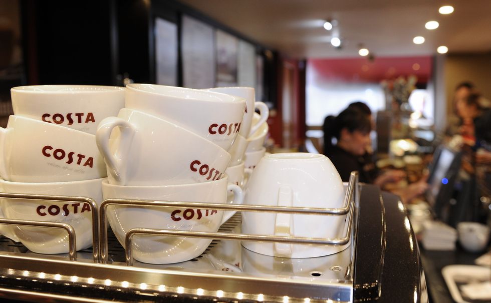 Costa cups in cafe