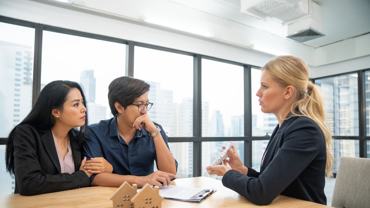 Couple at estate agents