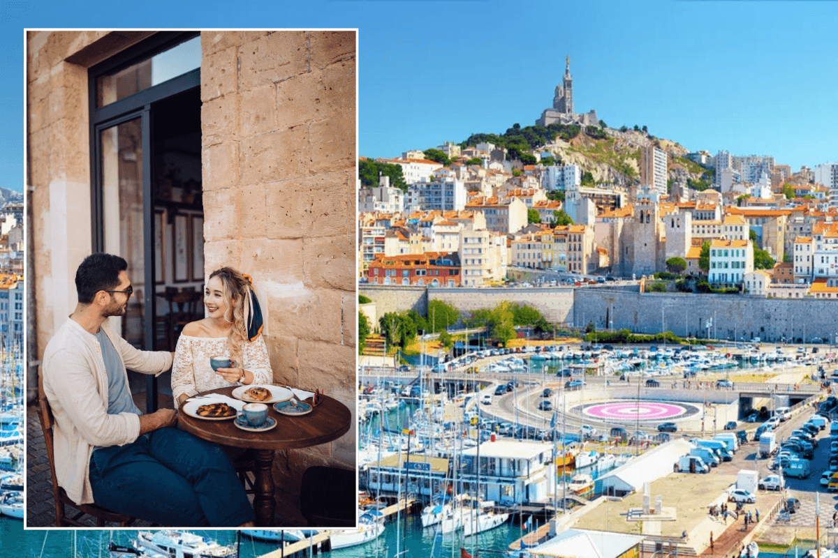 Couple dining outside on European holiday / Marseille, France