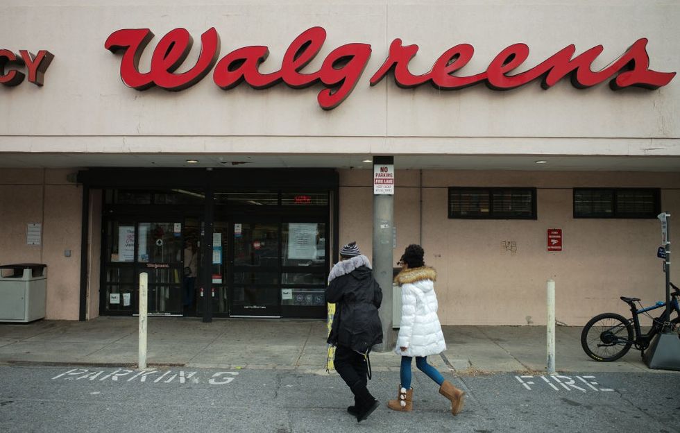 Couple going into a Walgreens