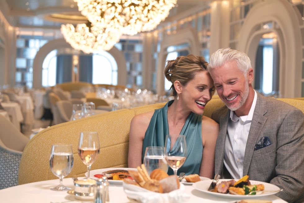 Couple in dining room on board Oceania Cruises