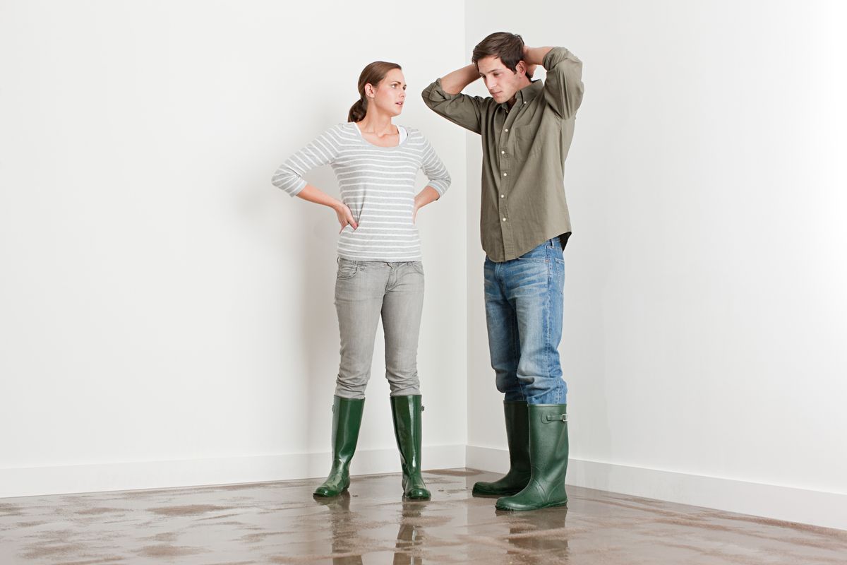 Couple in flooded house