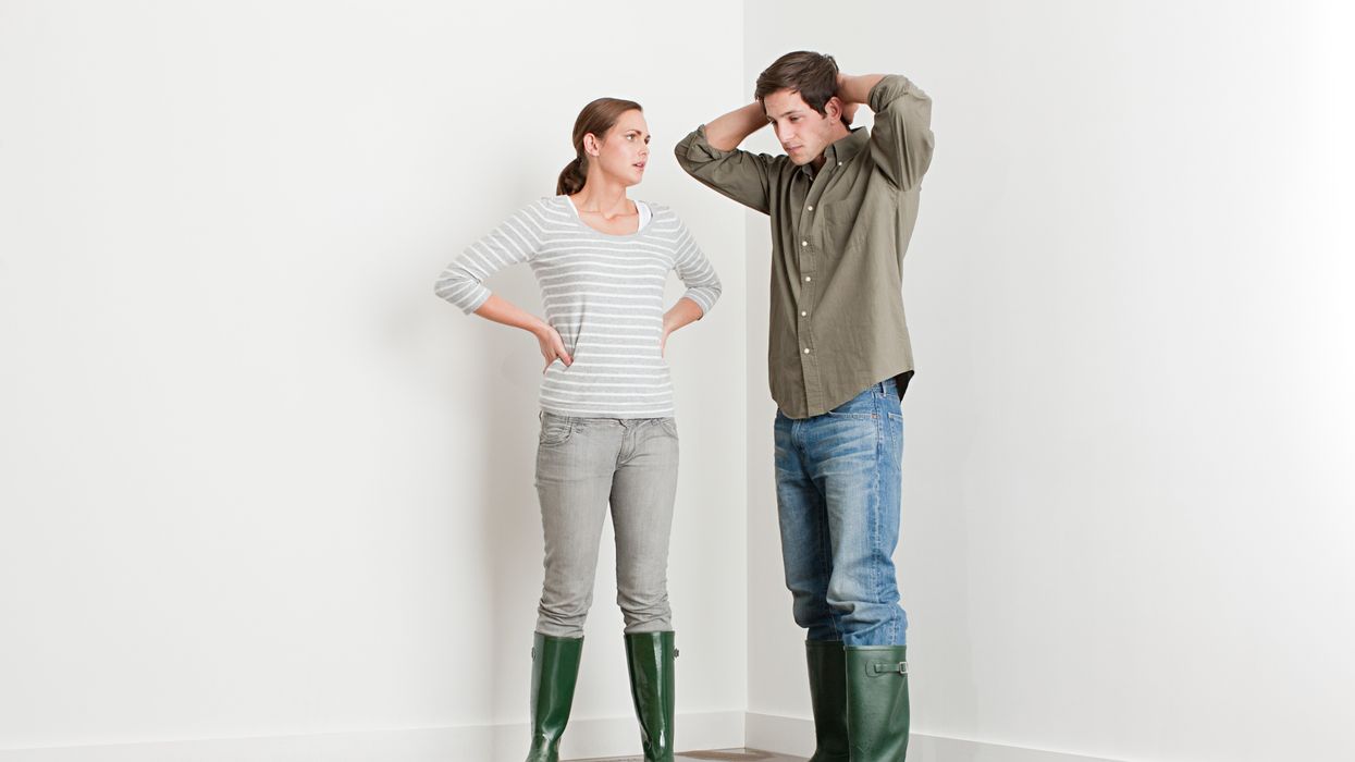 Couple in flooded house