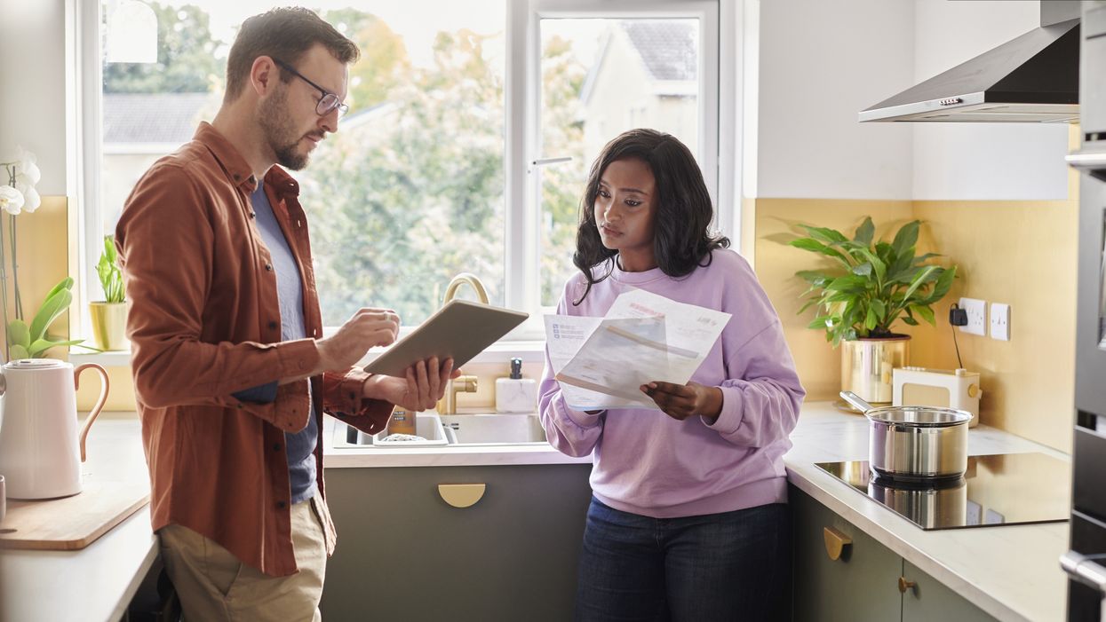 Couple look at energy bills