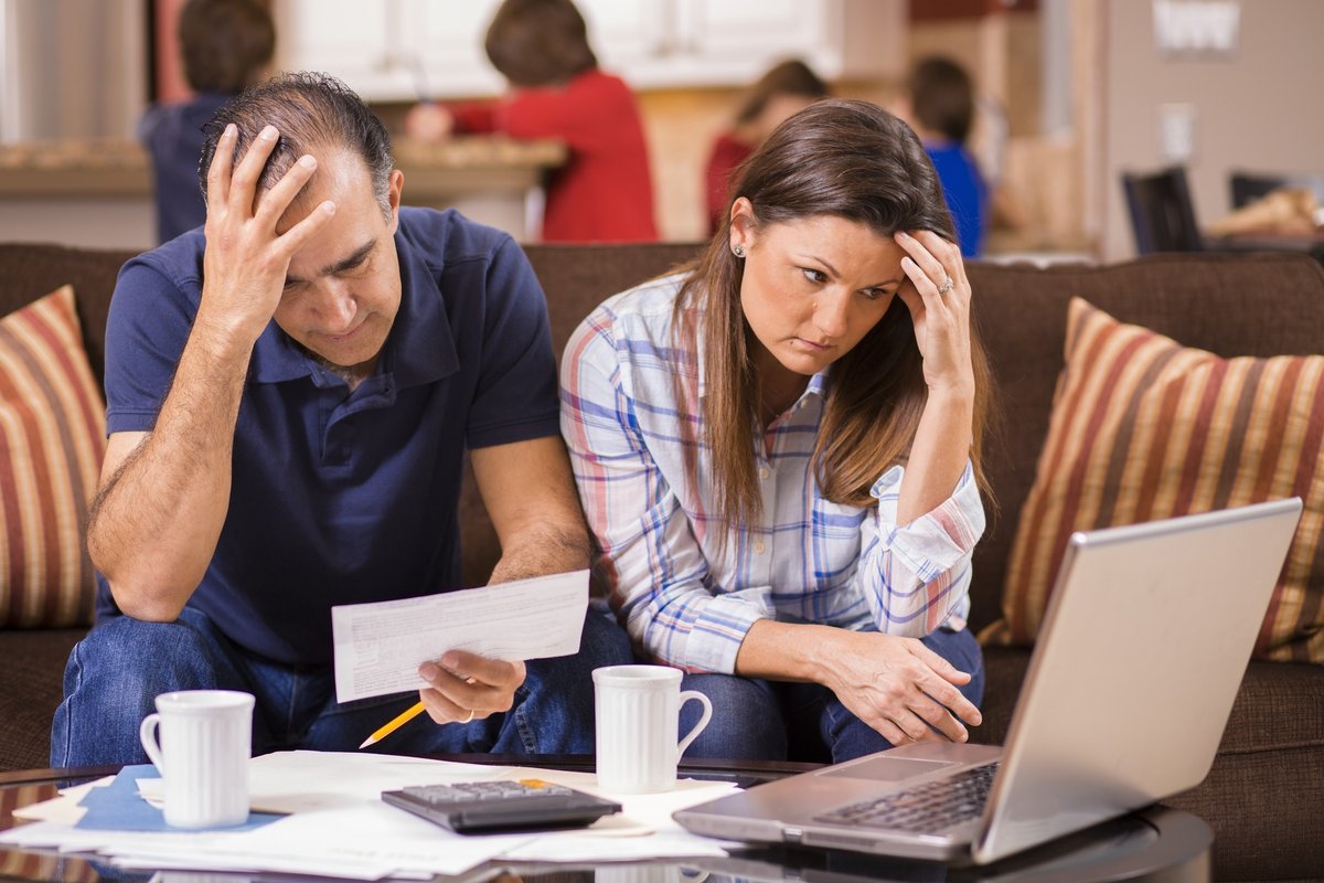 Couple looking at a laptop