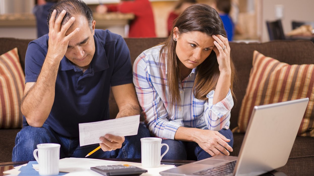 Couple looking at a laptop
