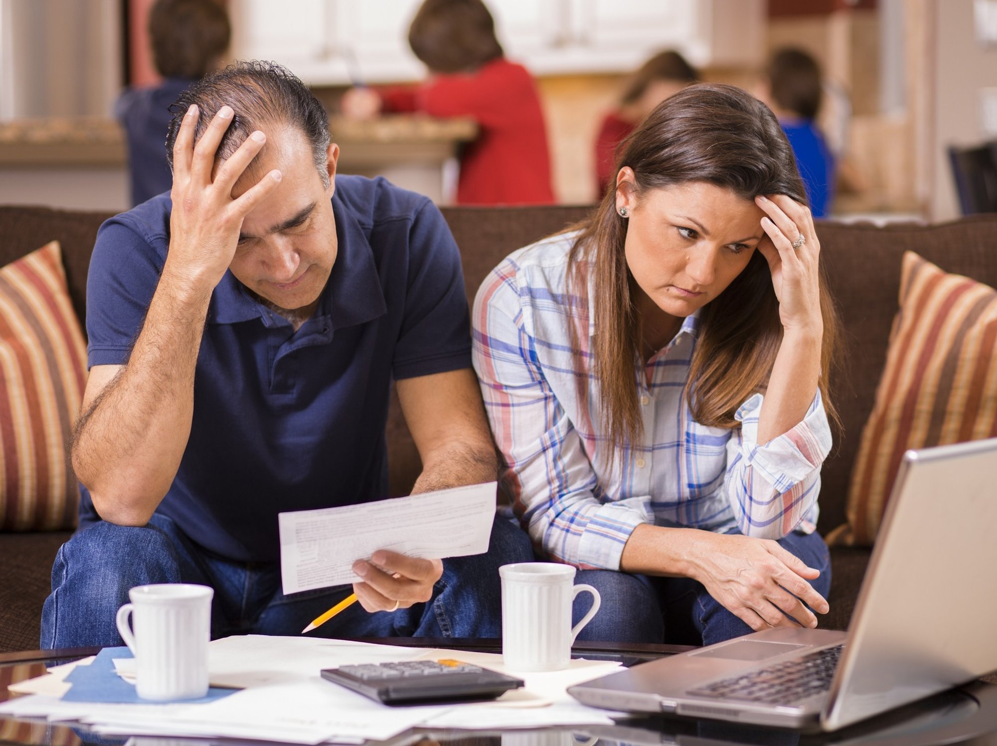 Couple looking at a laptop