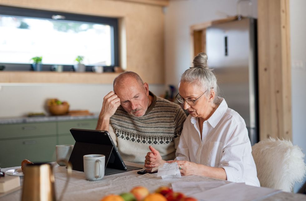 Couple looking at bills