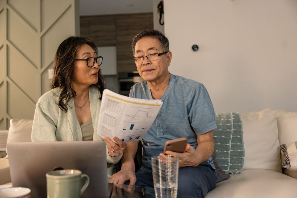 Couple looking at document