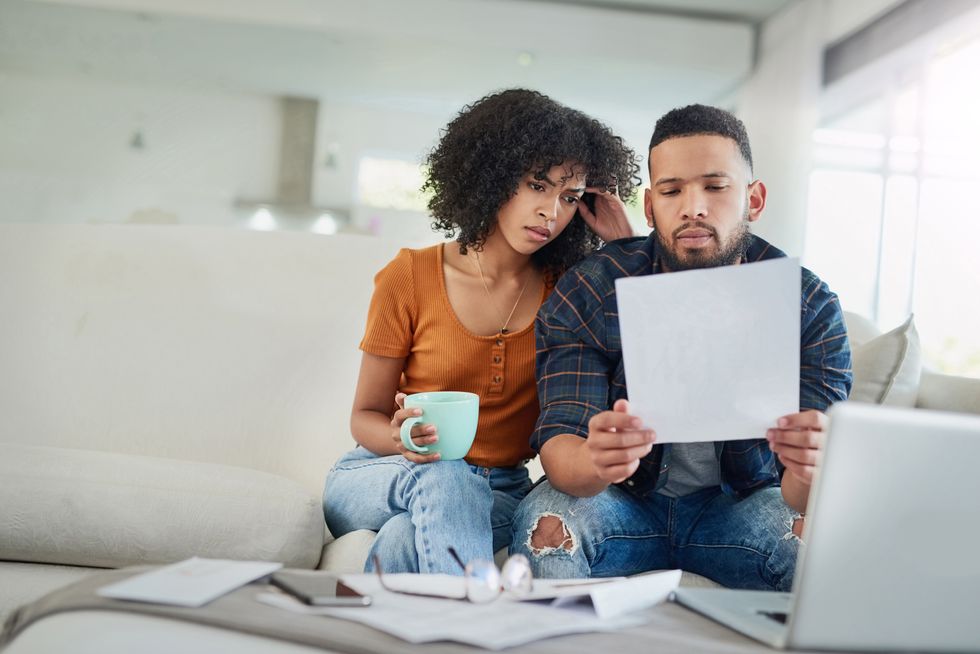 Couple looking at financial papers