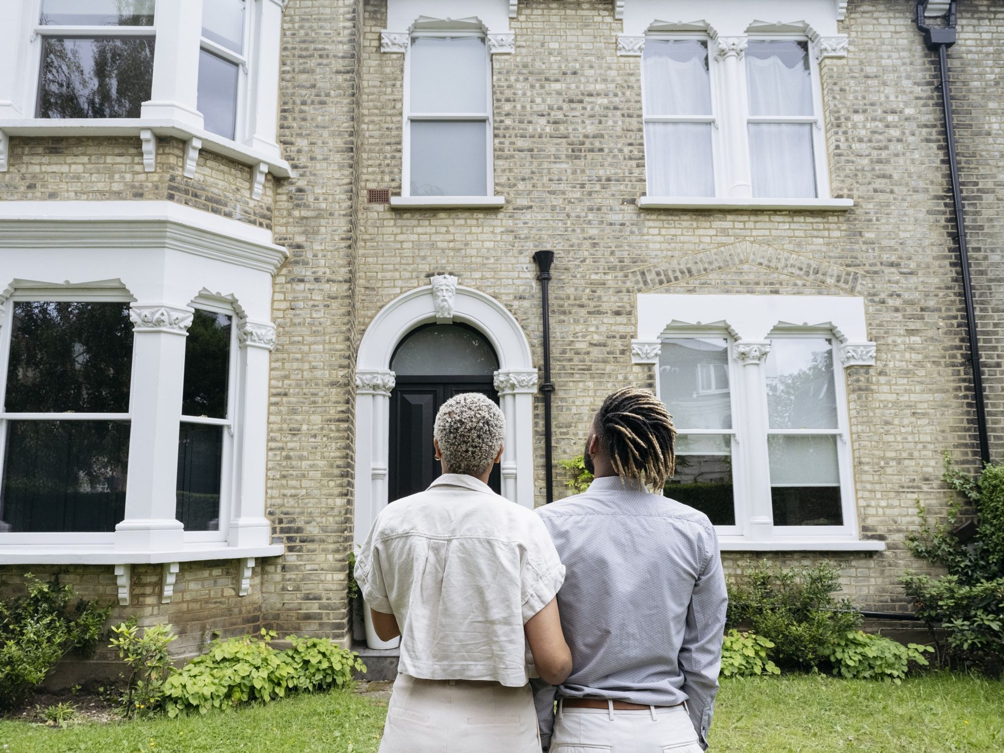 Couple looking at house