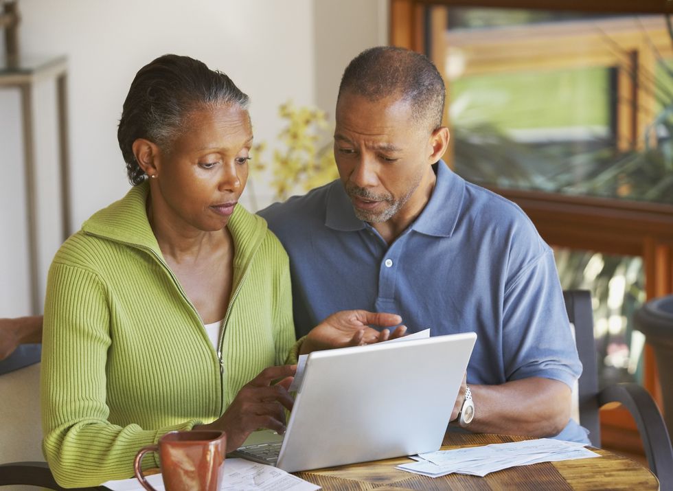 Couple looking at laptop