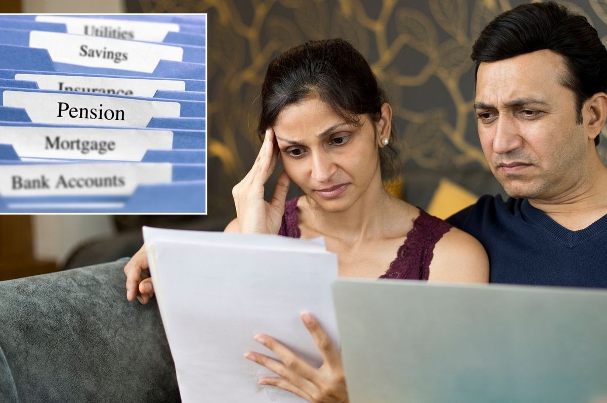 Couple looking at pension documents
