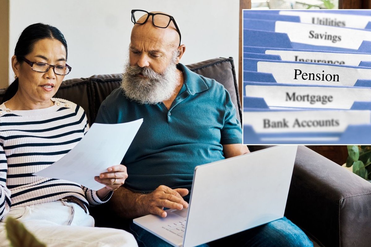 Couple looking at pension documents