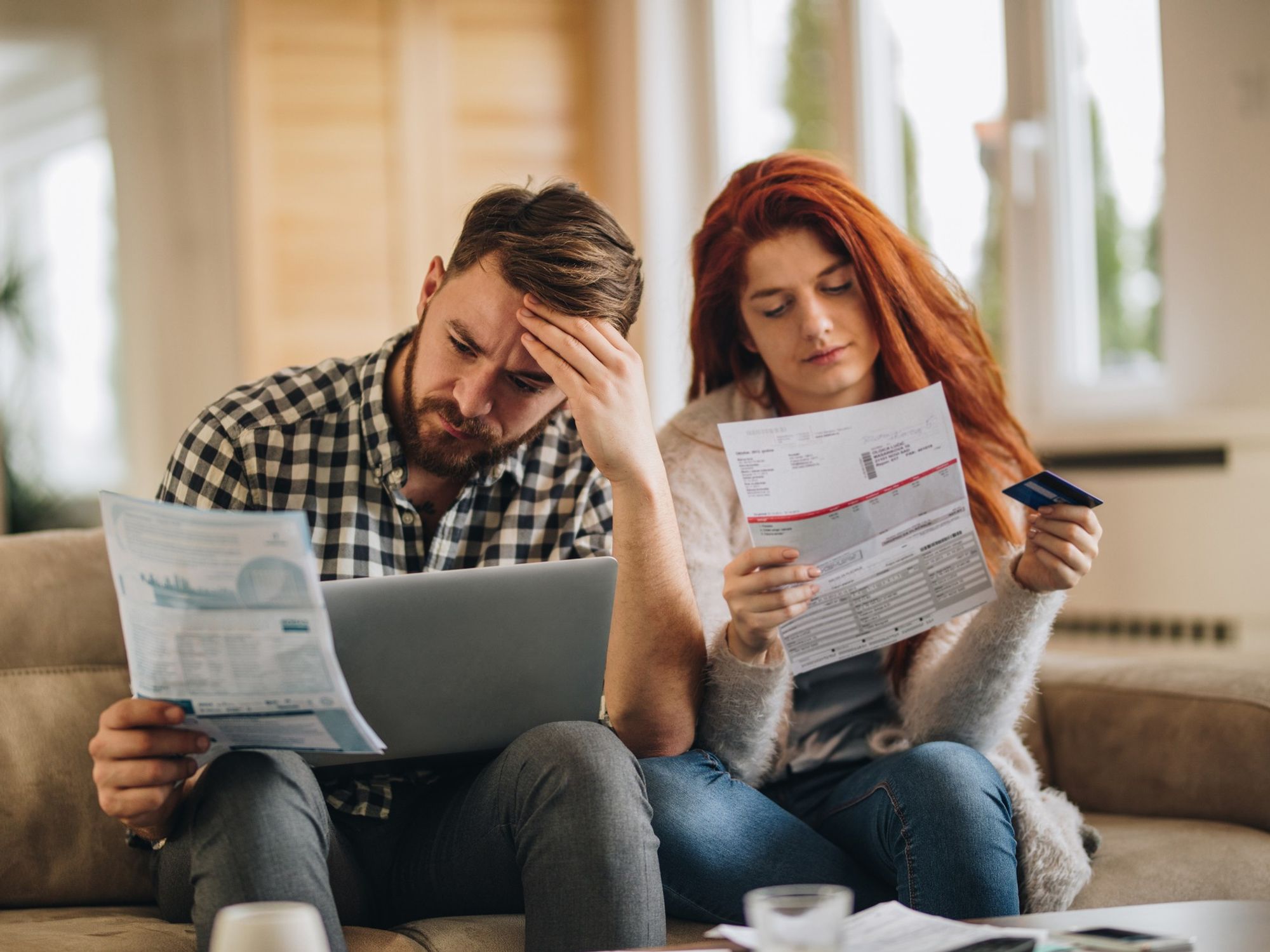 Couple looking at water bills