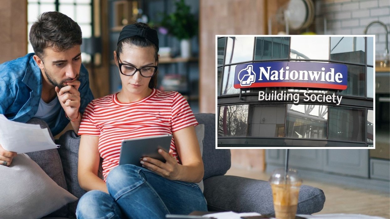 Couple looking iPad at documents