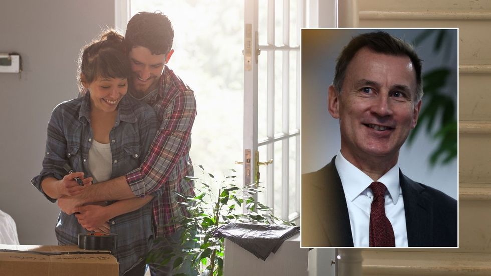 Couple moving into home and Jeremy Hunt at event