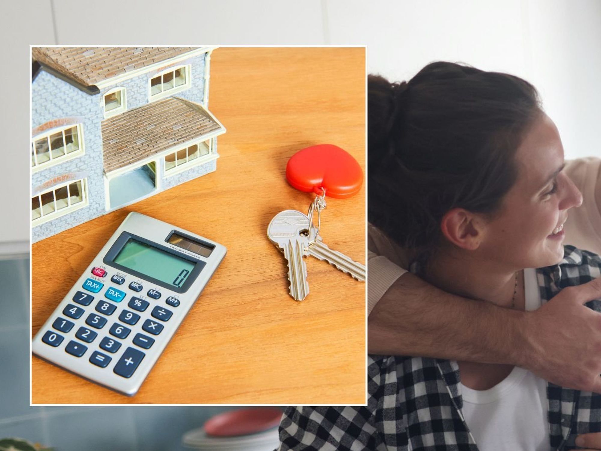 Couple moving into house, calculator and keys