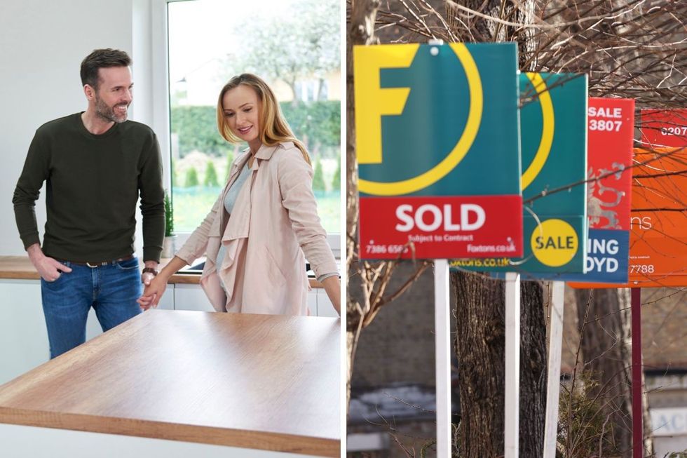 Couple next to kitchen countertops / For sale signs