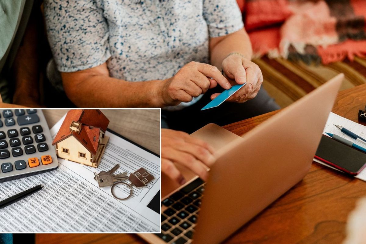 Couple paying and mortgage documents