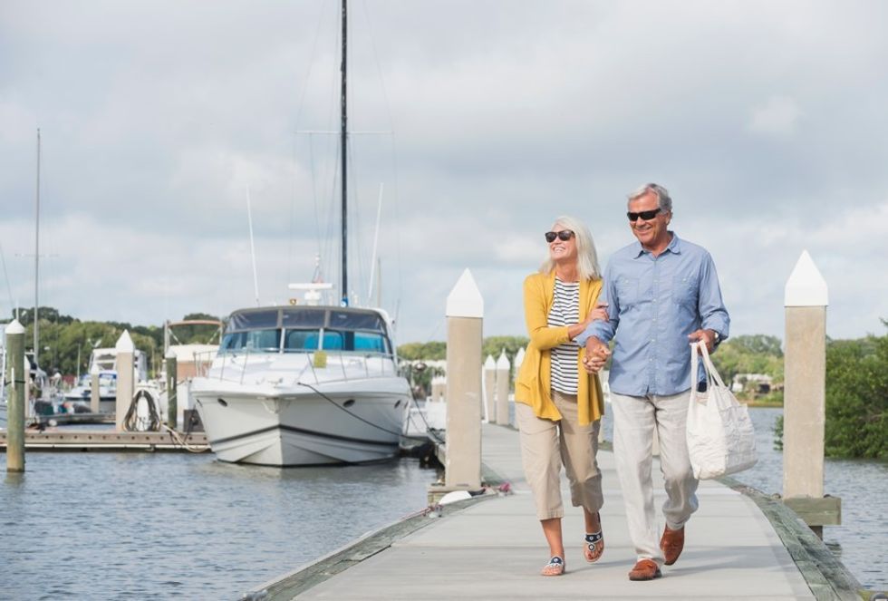 Couple walking on dock