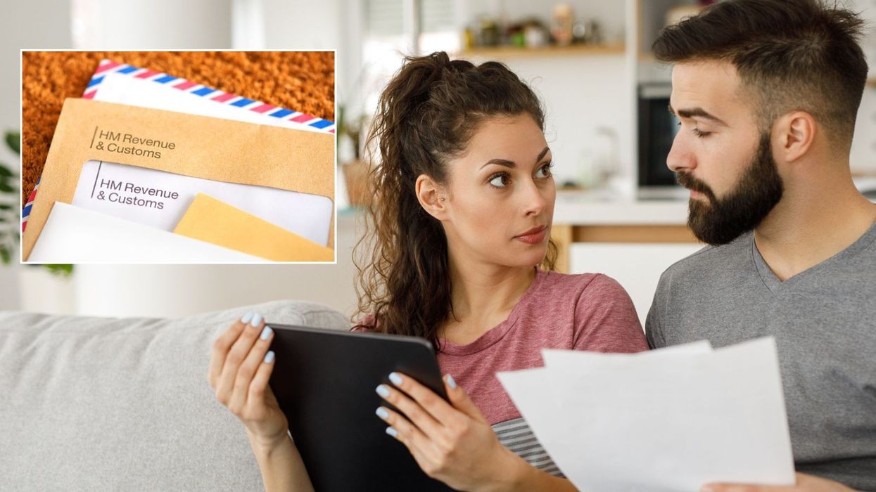 Couple worried looking at HMRC letter