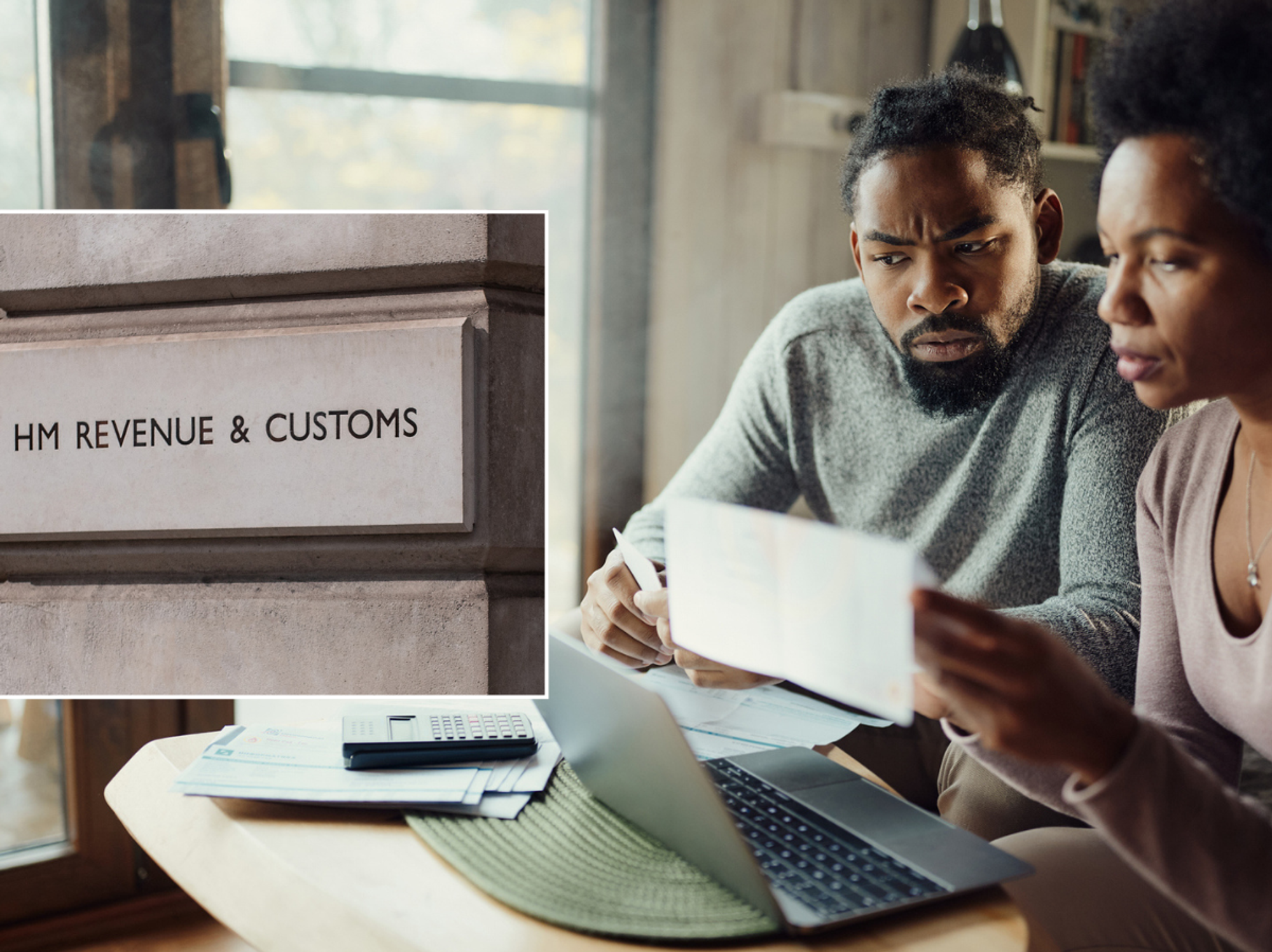 Couple worried looking at taxes