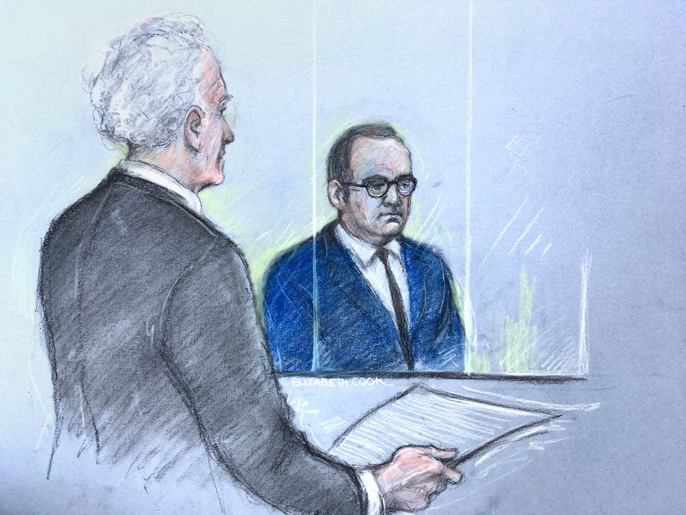 Court artist sketch by Elizabeth Cook of Patrick Gibbs QC defending actor Kevin Spacey (right) in the dock at Westminster Magistrates Court in London, after being charged with sexual offences against three men. The 62-year-old former Hollywood star is accused of four counts of sexual assault and one count of causing a person to engage in penetrative sexual activity without consent. Picture date: Thursday June 16, 2022.