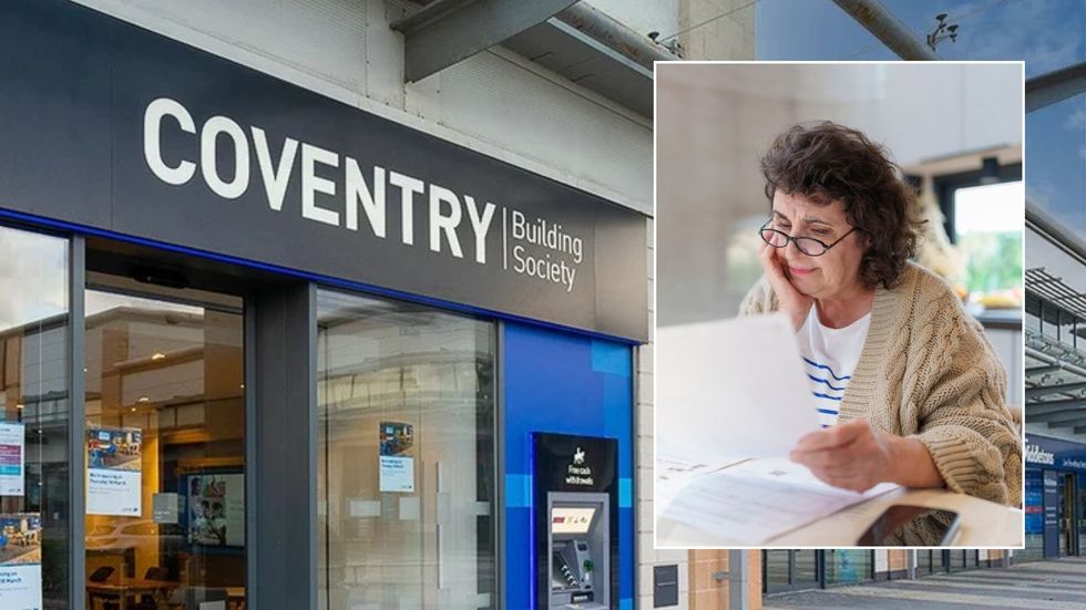Coventry Building Society and woman looking at form