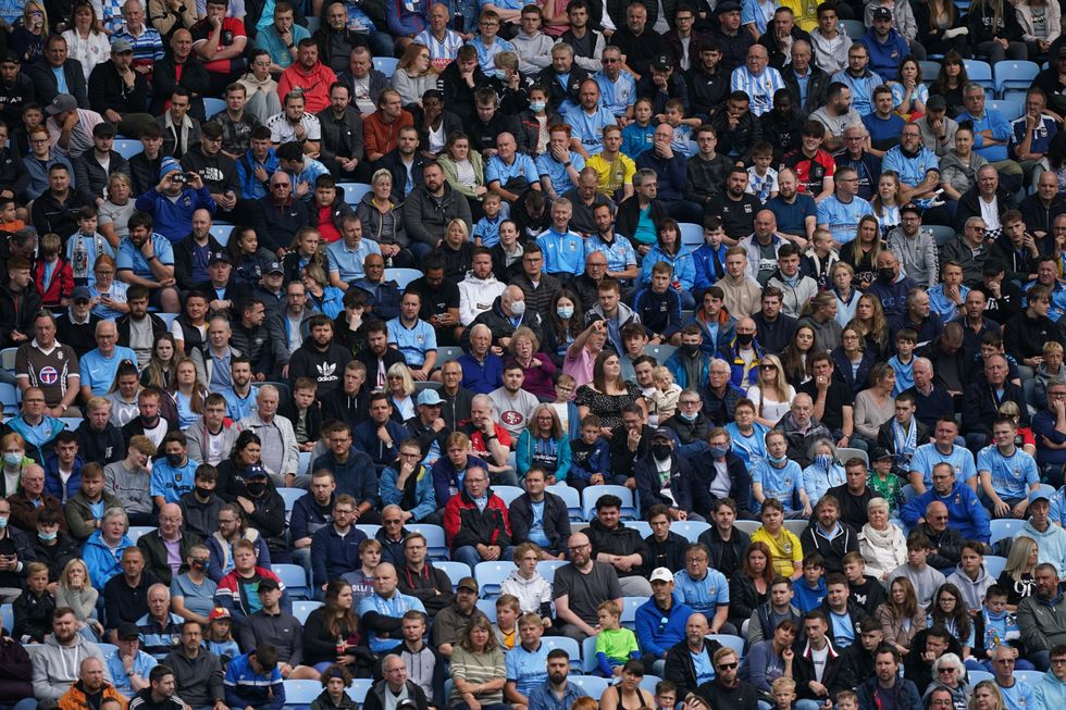 Coventry City fans watch the action during the pre-season friendly match at the Coventry Building Society Arena.